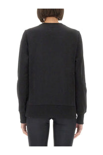 Versace jeans couture women’s black sweatshirt with ribbed cuffs and hem in soft long-sleeved fabric