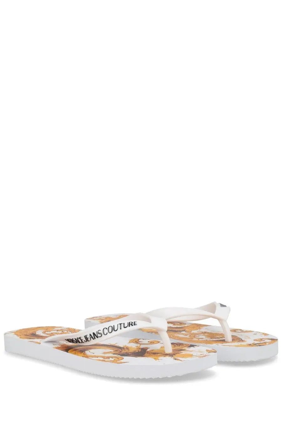 Versace Jeans Couture women’s white thong sandals with gold and brown ornate baroque pattern on soles