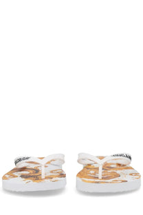 Versace Jeans Couture white thong sandal with gold brown ornate pattern and black versace logo strap