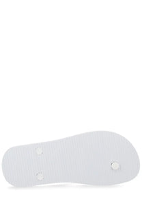 Versace Jeans Couture women’s white rubber thong sandal sole with two circular strap holes visible from the back side