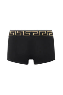Versace men’s grey boxer shorts featuring black briefs with a gold Greek key pattern on the waistband