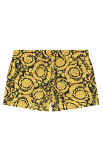 Versace men’s boxer swimsuit gold in yellow and black with ornate baroque patterned swim trunks design