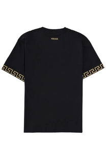 Versace men’s black t-shirt featuring gold Greek key pattern trim on sleeves and small Versace logo at the neckline