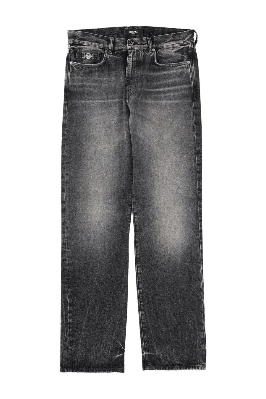 Versace men’s black distressed denim jeans with faded wash and visible wear patterns front view