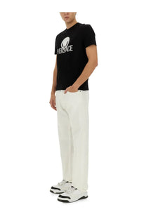 Versace men’s black jersey t-shirt featuring a white medusa head logo and brand name across the chest
