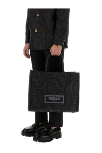 Versace men’s large shopper bag Athena baroque black tote with embossed baroque pattern and gold-tone logo plaque