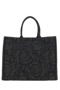 Versace men’s large shopper bag Athena Baroque black tote with intricate darker black floral embroidery and structured handles