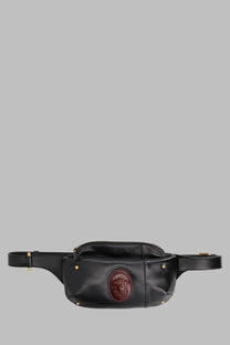 Black leather versace men’s marsupio small waist bag with a prominent brown medusa emblem on the front