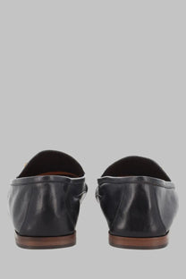 Versace men’s mocassino in pelle black leather loafers with sleek minimalist design and brown soles