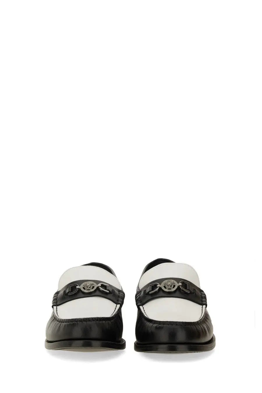 Versace men’s black and white leather loafers with a silver medusa head buckle in moccasin style