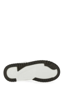 White and black rubber sole with textured tread pattern of versace men’s odyssey sneaker black