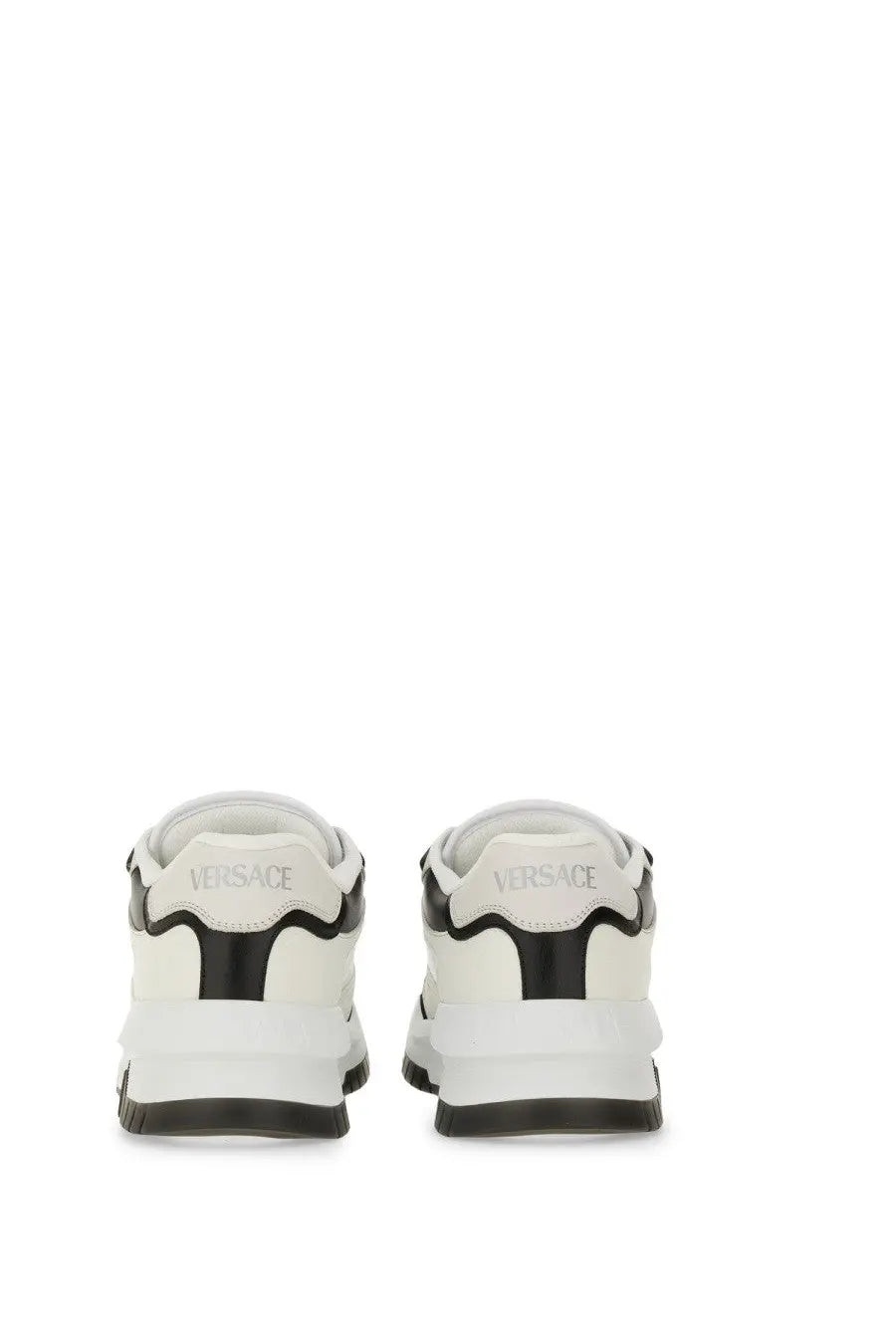 Versace men’s odyssey sneaker black showing the back with white and black leather panels and bold heel branding