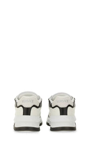 Versace men’s odyssey sneaker black showing the back with white and black leather panels and bold heel branding