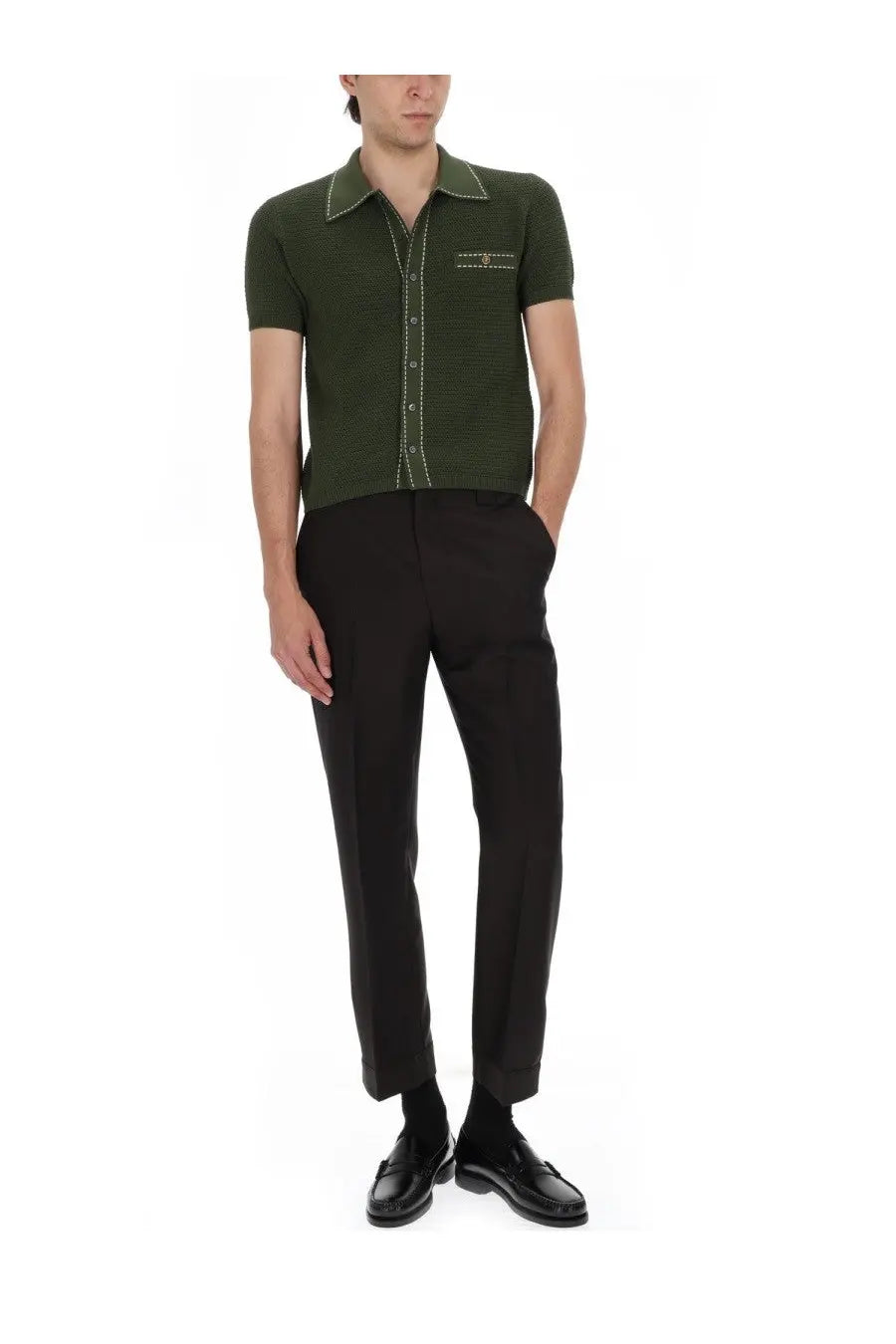 Olive green short-sleeved knit button-up shirt with white stitching paired with versace men’s pantalone in lana mohair brown