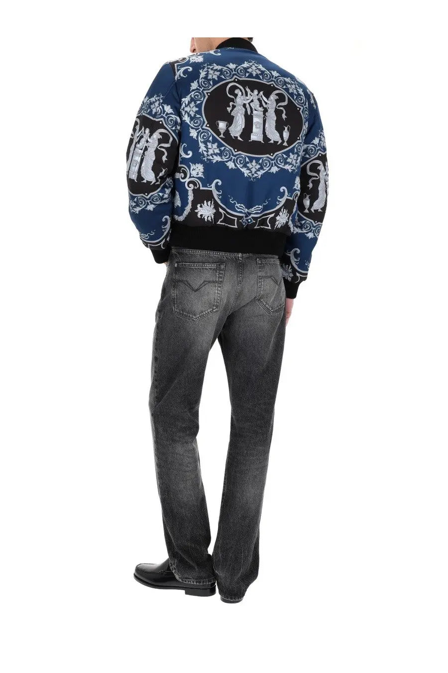 Versace men’s reversible bomber jacket black with blue side featuring intricate white and black classical figure patterns