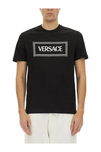 Black cotton Versace men’s t-shirt with bold white logo inside checkered rectangular frame