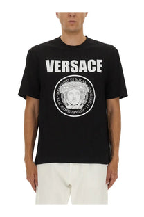 Versace men’s black t shirt featuring a bold white logo with medusa head emblem and versace text
