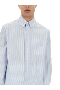 Versace men’s striped shirt in light blue and white with vertical stripes and subtle embroidered chest pocket logo