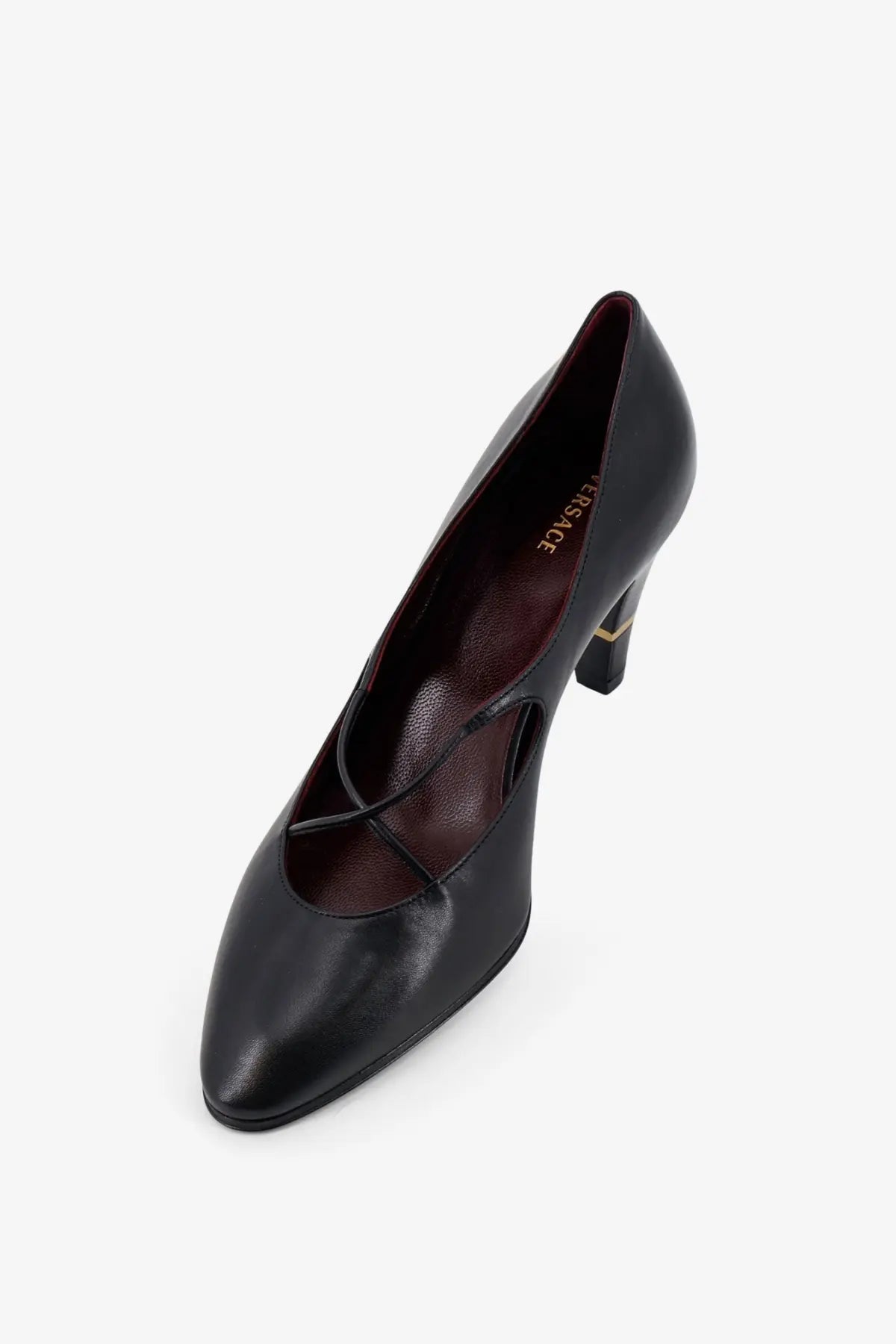 Versace women’s black leather pump with pointed toe and crisscross strap detail elegant medallion design