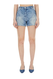 Versace women’s blue denim shorts with a subtle swirling pattern on the fabric