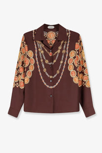 Versace women’s informal brown silk blouse with bold gold and orange medallion print and layered chain motifs
