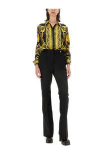Versace women’s la coupe des dieux black and gold silk blouse with ornate baroque inspired pattern