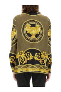 Versace women’s olive green silk blouse with bold gold and black baroque print featuring Medusa motif