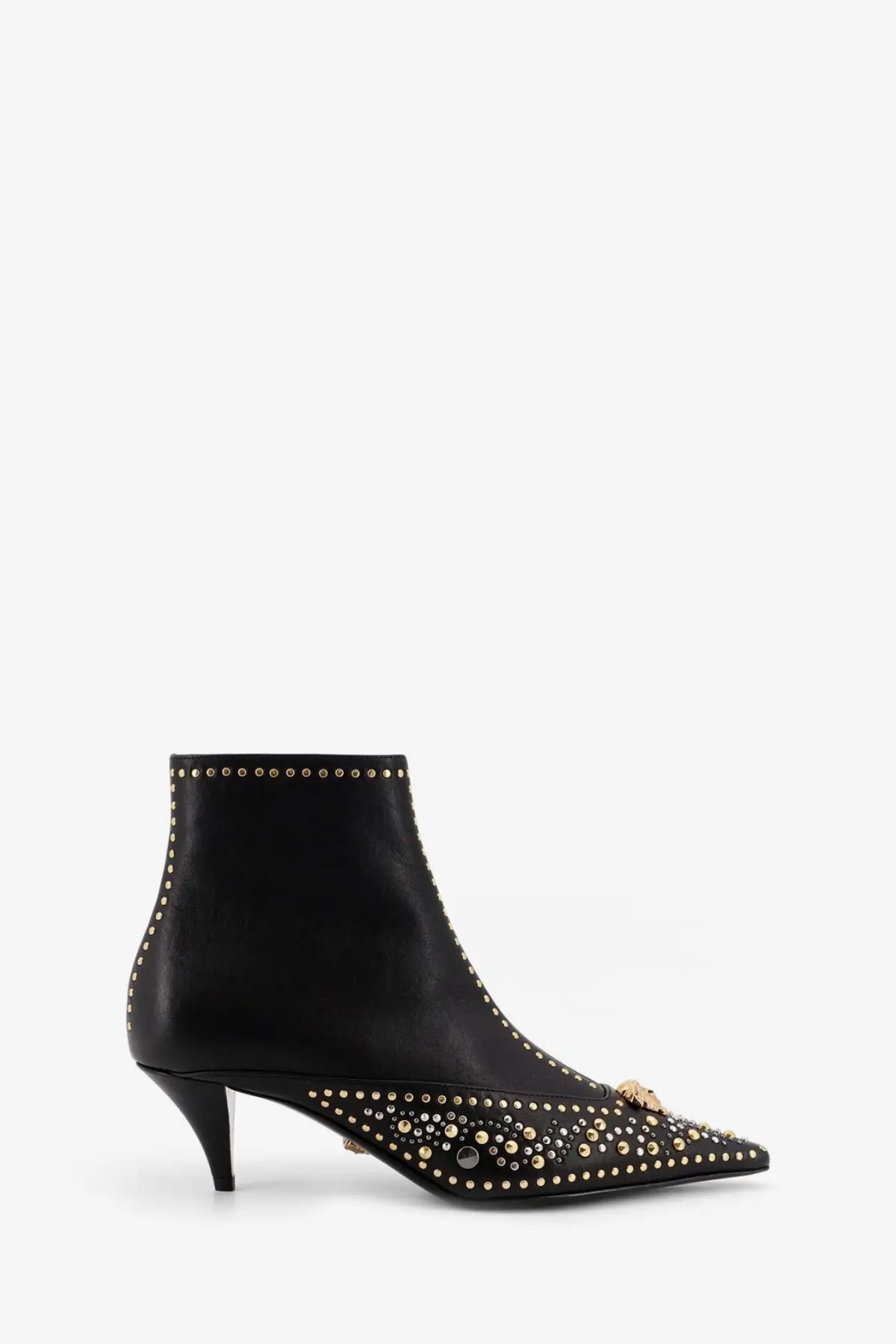 Versace women’s black leather ankle boot with gold tone studs and decorative metallic clasp at the toe