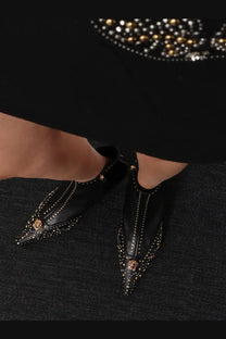 Versace womens black leather ankle boots with pointed toe gold-tone studs and central medusa head emblem