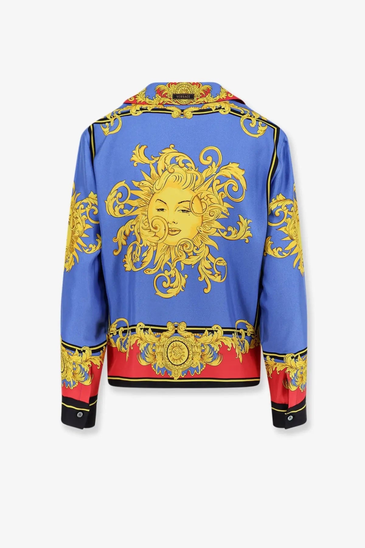 Versace women’s multicolor silk shirt in blue with bold gold medusa head print and red hem and cuff accents