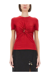 Versace women’s vibrant red short-sleeved top with central twisted knot and gold-tone safety pin detail