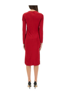 A vibrant red versace women’s long-sleeved midi dress with a sleek silhouette and subtle side slits
