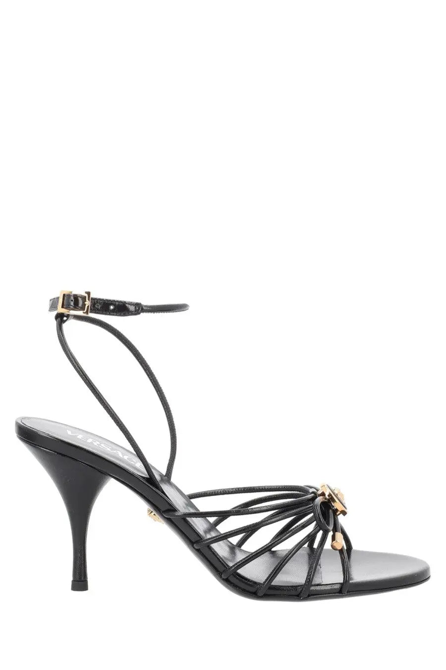 Versace women’s sandalo opera bow black leather sandal with gold-tone hardware and slender heel front view