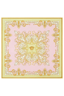 Versace women’s multicolor scarf featuring a pink base with gold and white ornate baroque patterns and a medusa head motif