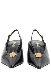 Versace women’s jellyfish black slingback pumps in black patent leather with gold-tone medusa head embellishments