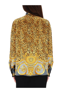 Versace women’s silk blouse in grey with gold and black leopard print and ornate baroque hem detailing