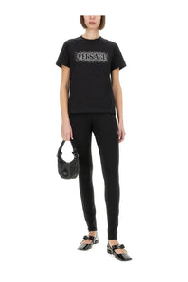 Versace women’s black t-shirt with a sparkling silver logo across the chest starry sky design