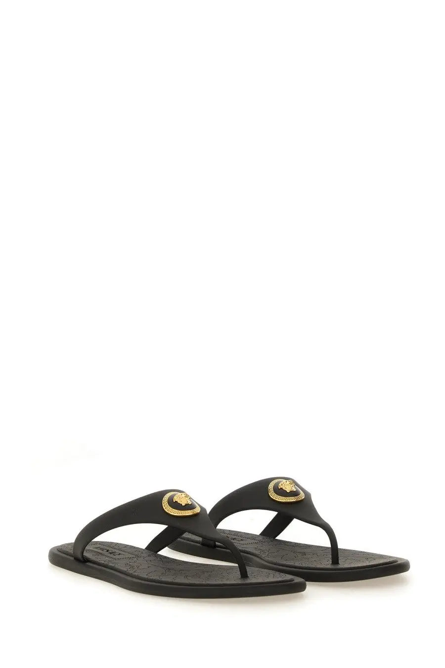 Versace women’s thong sandal Alia black flip-flops with gold-toned Medusa head embellishments on straps