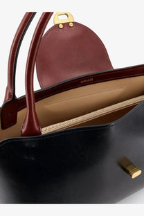 Versace women’s vivian leather shoulder bag in black with burgundy handles gold hardware and embossed logo lining