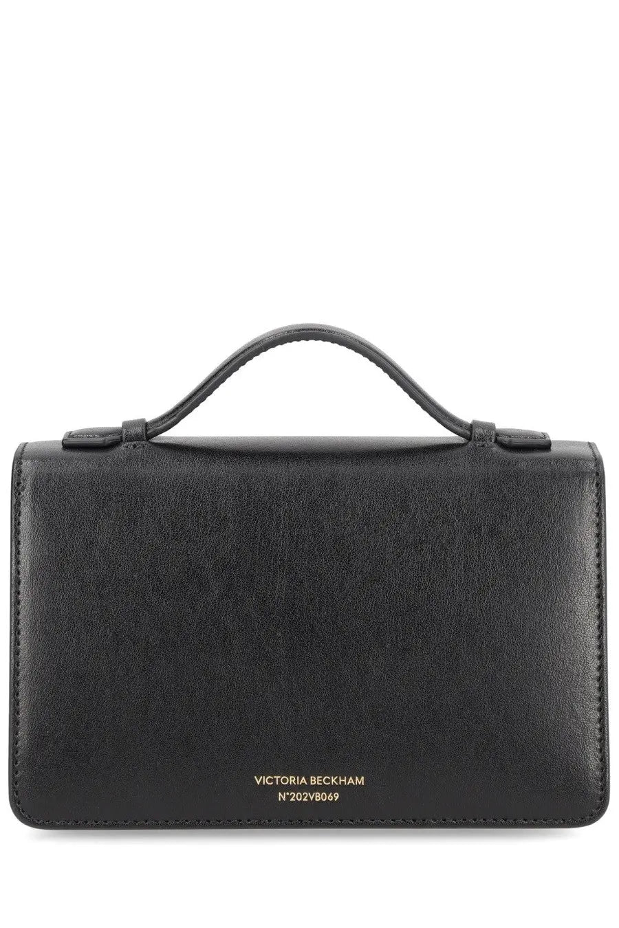 Black leather victoria beckham dorian small handbag with top handle and gold tone branding at the bottom