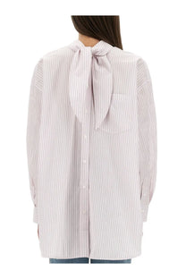 Victoria Beckham women’s blouse in soft lavender and white striped fabric with tied bow at back neckline shown from back