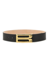 Black leather Victoria Beckham women’s jumbo frame belt with sleek gold-tone rectangular buckle and embossed logo design