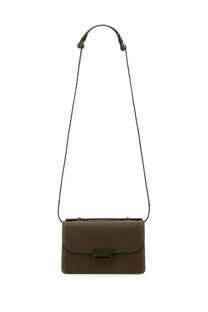 Victoria Beckham women’s mini Dorian bag in olive green leather with minimalist rectangular design and black adjustable strap