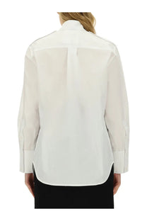 Victoria Beckham women’s oversize white blouse with a subtle sheen long sleeves and classic collar
