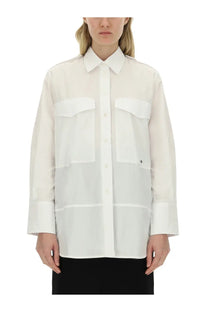 White sheer blouse by victoria beckham featuring a classic collar button-down front and two large chest patch pockets