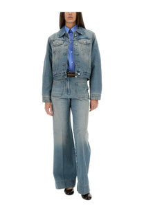 Victoria Beckham women’s light-wash padded denim jacket in blue with classic button closures and flap pockets