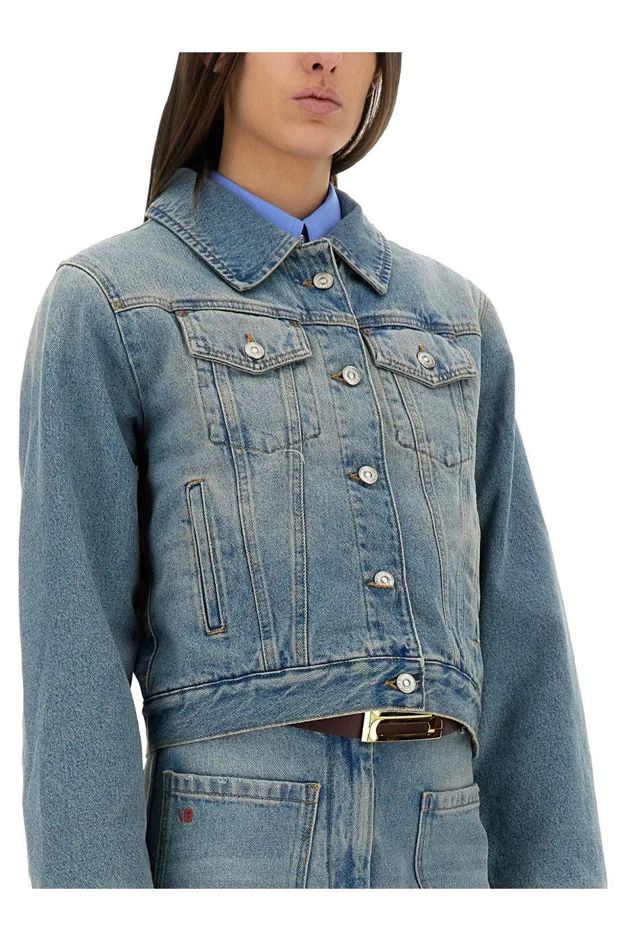Victoria Beckham women’s padded light-wash denim jacket with classic button-front design and silver-toned buttons