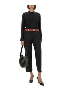 Black leather handbag with structured shape and dual top handles from victoria beckham women’s silk shirt black collection