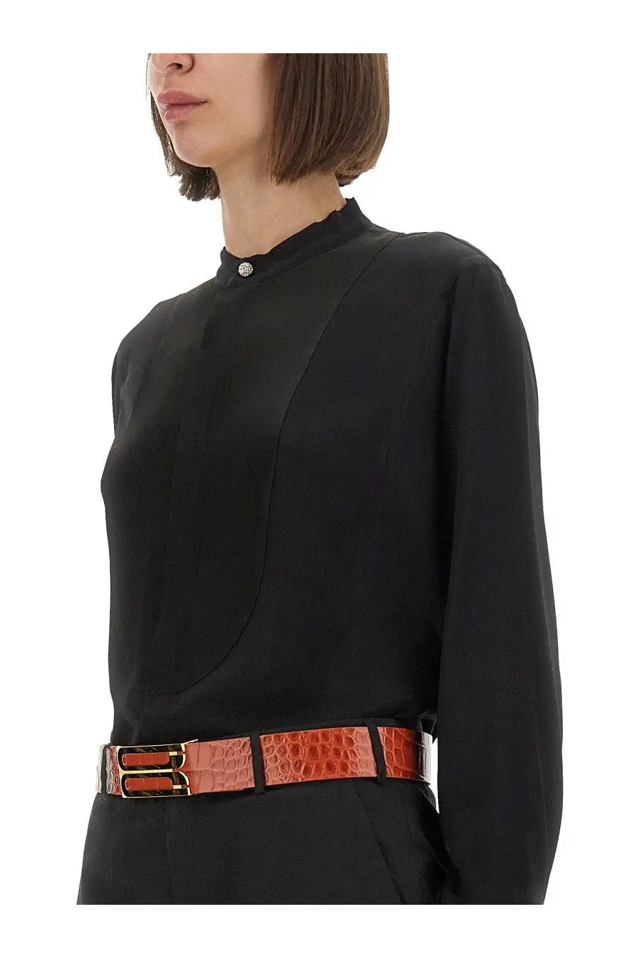 A sleek orange crocodile-textured belt with a gold-tone buckle paired with victoria beckham women’s black silk shirt