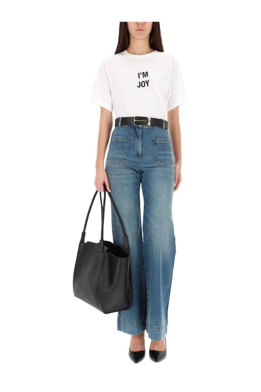 Black leather tote bag with top handles and minimalist design paired with victoria beckham women’s slogan shirt white